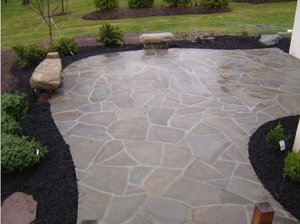 Irregular Tigard flagstone walway with boulder benches