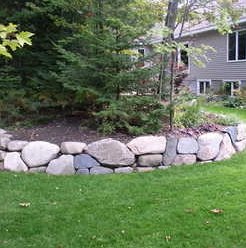 Natural Rock stacked low retaining wall, Tigard landscaping